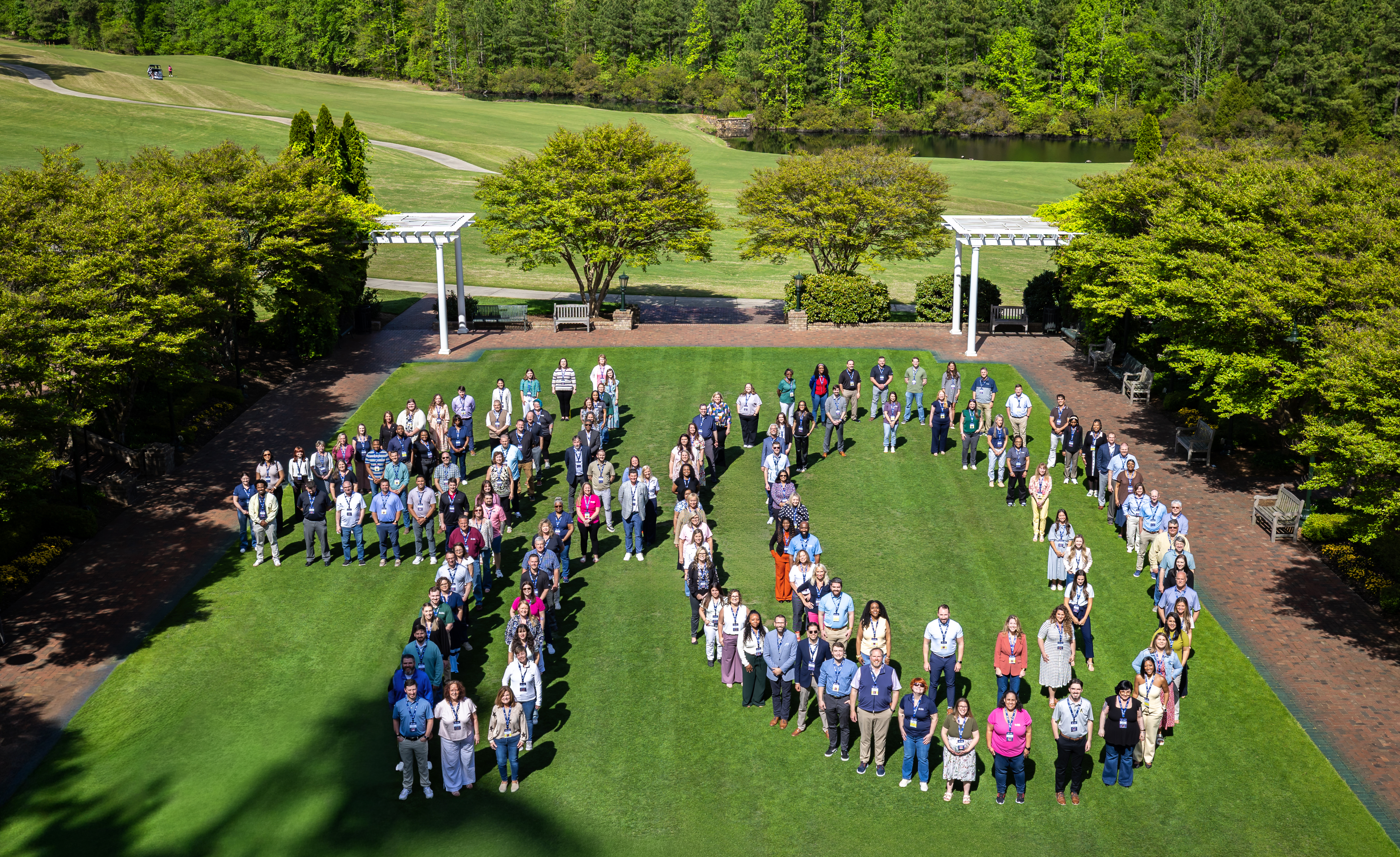 Employees gathered in group photo. 
